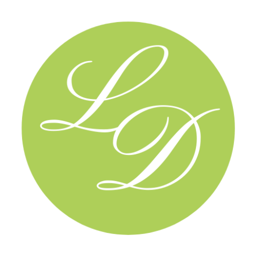 Logo with scripted L 7 D letters in a green circle