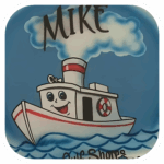 The Tuggin' Along Airbrushed Tee is an original design featuring a red & white cartoon boat on the water with steam coming from the top against a blue background.