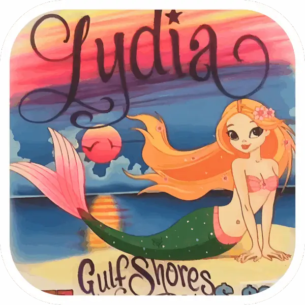 Image of Mermaid laying on the beach with a rainbow sunset in the background